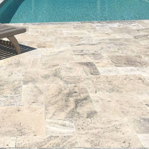 travertine pavers that can be added around the pool. This is a light color travertine paver